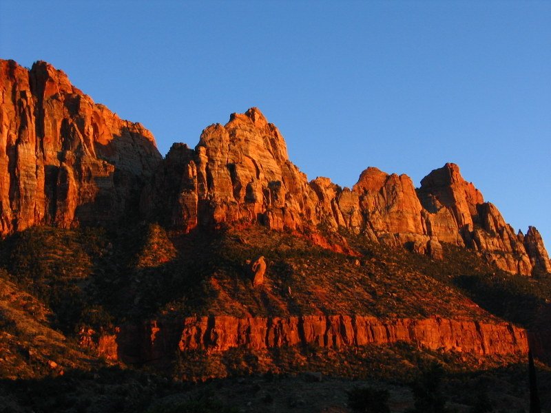 Sunset lights up the rock-face at Zion National Park
